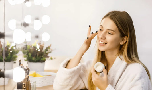 Woman-applies-face-cream